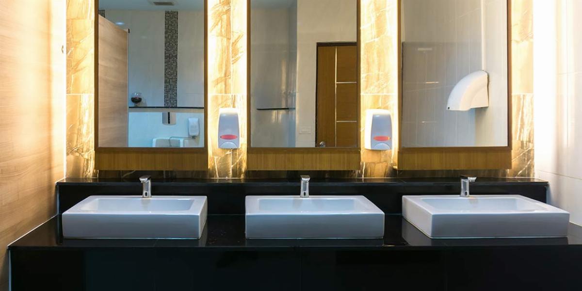 Commercial Restaurant Bathroom With Three Modern Sinks and LED Lighting