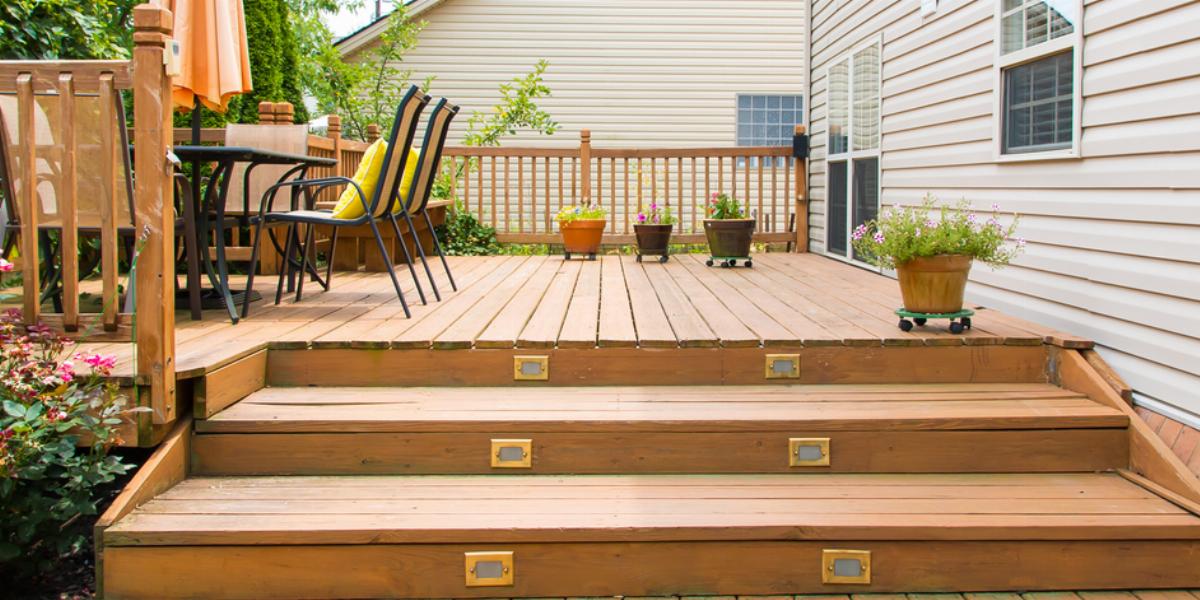 Wood deck with patio furniture.